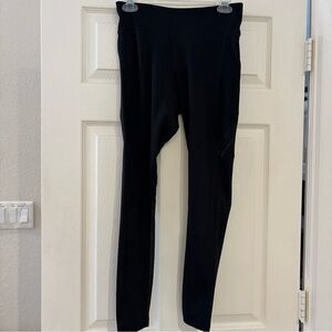 Nike Dri-FIT Black Leggings Sz M, sheer side pockets and inseams full length